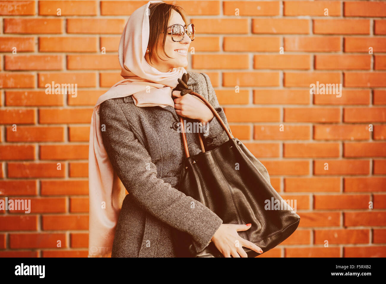 girl in a coat on the street Stock Photo - Alamy