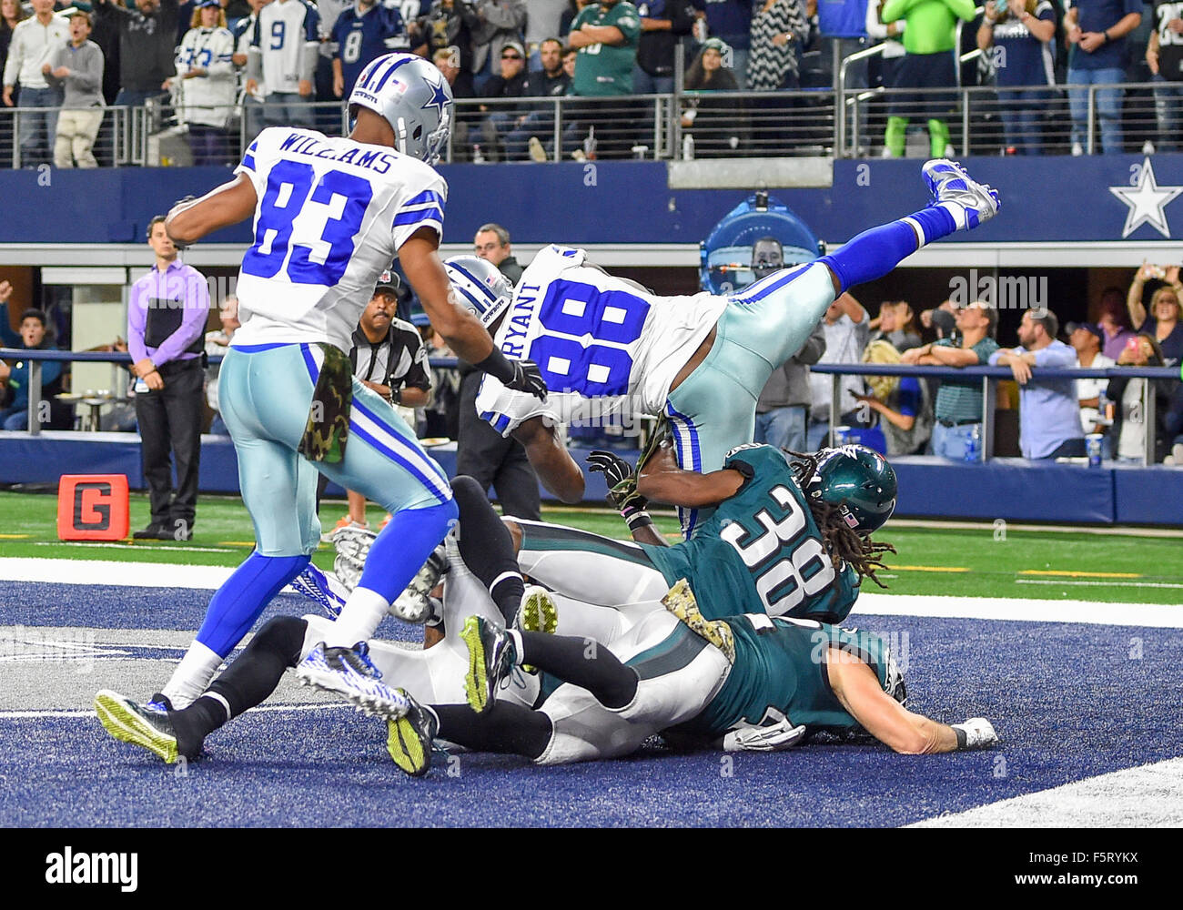November 08th, 2015:.Dallas Cowboys wide receiver Dez Bryant (88) goes up for a hail mary pass and makes the catch for a touchdown as Philadelphia Eagles free safety Chris Maragos (42) and Philadelphia Eagles cornerback Nolan Carroll (23) defend.during an NFL football game between the Philadelphia Eagles and Dallas Cowboys on Sunday night at AT&T Stadium in Arlington, Texas. Eagles win in overtime 33-27.Manny Flores/CSM Stock Photo