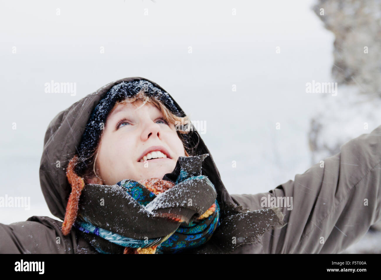 Sweden, Gotland, Young woman in snow Stock Photo