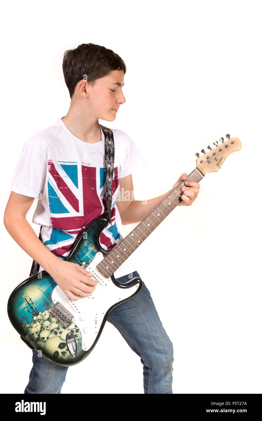 Teenage boy playing electric guitar Stock Photo