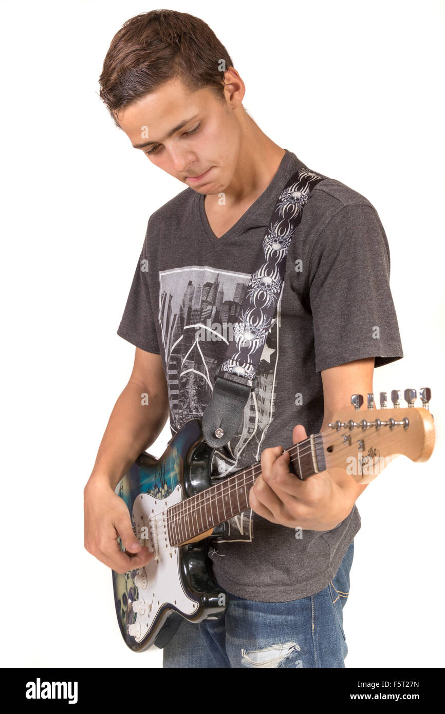 Teenage boy playing an electric guitar Stock Photo Alamy
