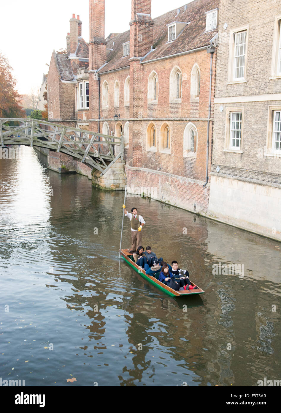 Tourists take a punt on the River Cam ride in the university city of Cambridge. Stock Photo