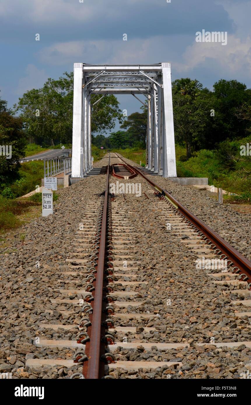 Railway bridge with rail tracks parallel to highway in Sri Lanka Stock Photo Alamy