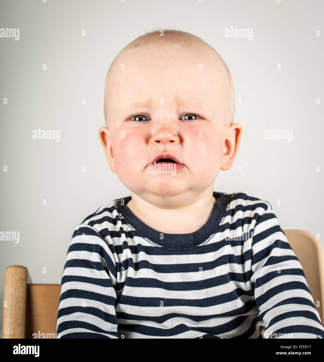 Finland, Portrait of boy (2-3) crying Stock Photo