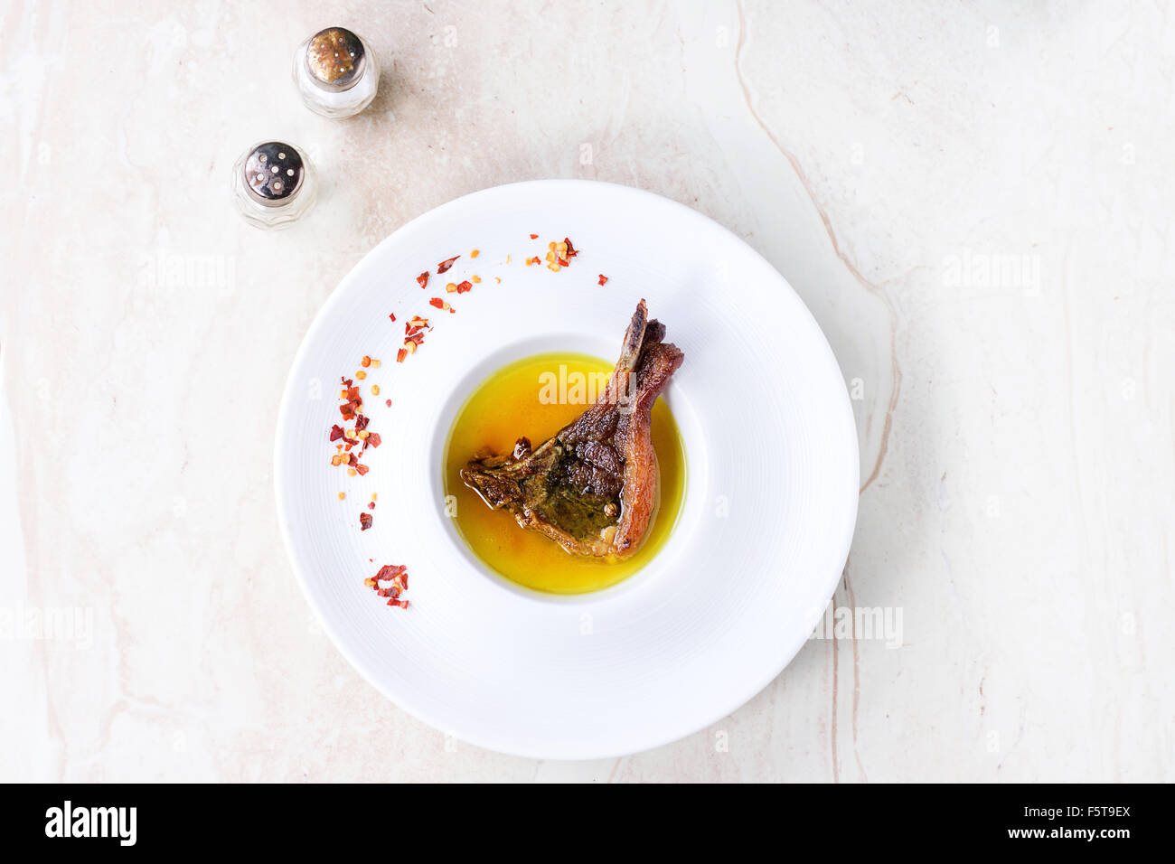 Well done grilled lamb chop Stock Photo Alamy