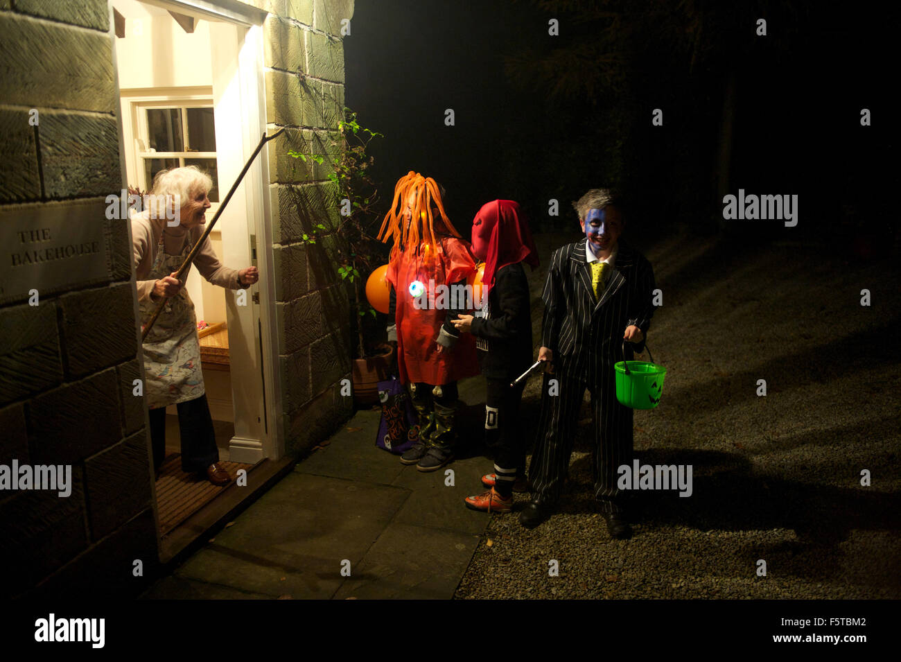 Trick or treating at Halloween in a village in North Yorkshire, England