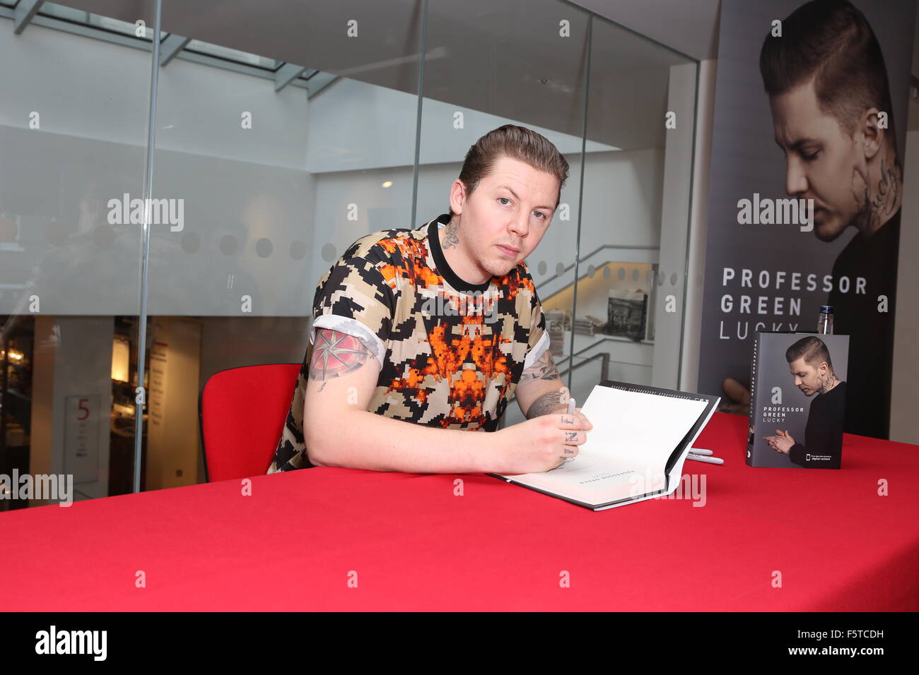 Doc Green Rapper British rapper Professor Green signs copies of his autobiography 'Lucky ...