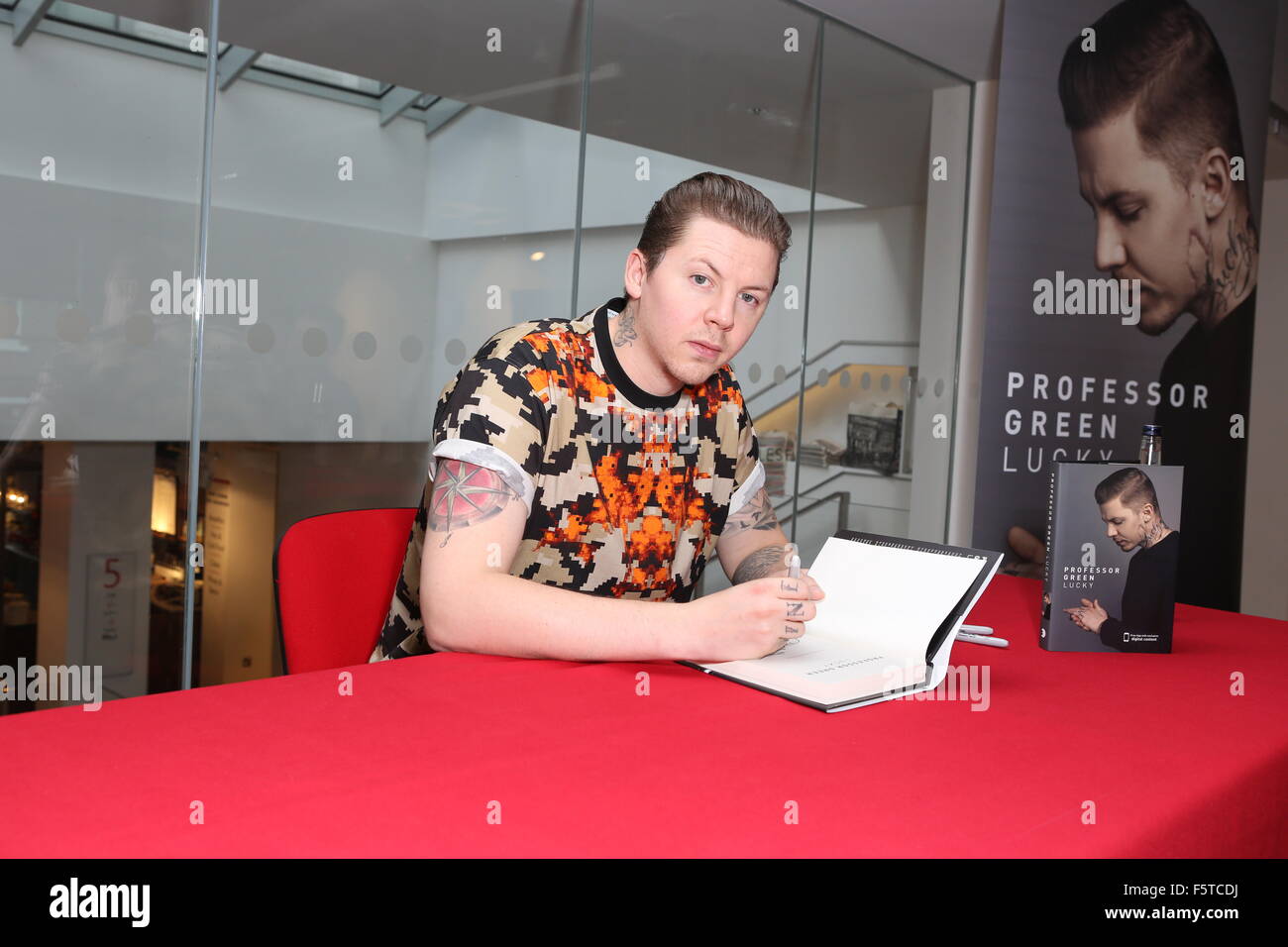 Dr Green Rapper British rapper Professor Green signs copies of his autobiography 'Lucky ...