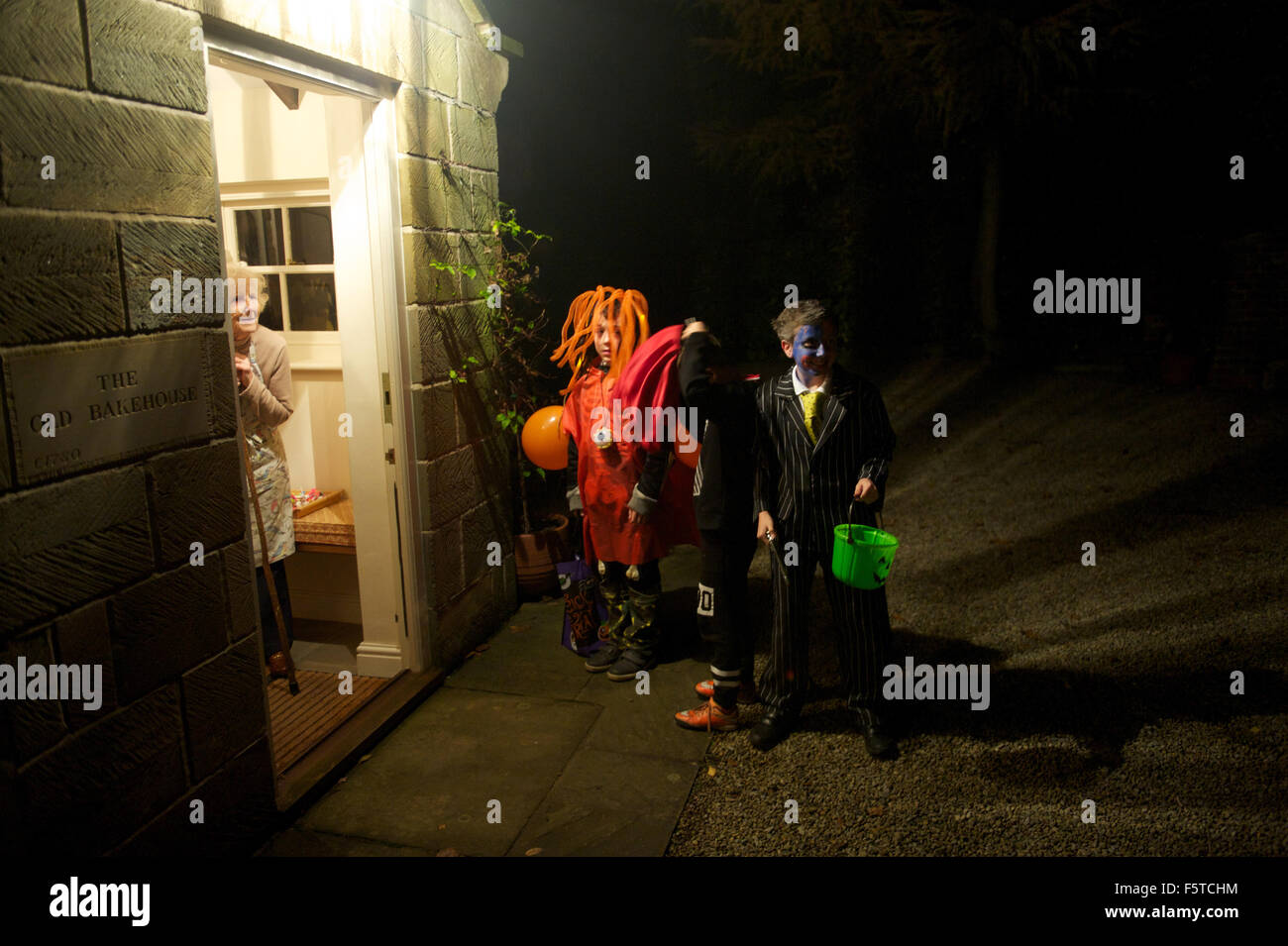 Trick or treating at Halloween in a village in North Yorkshire, England