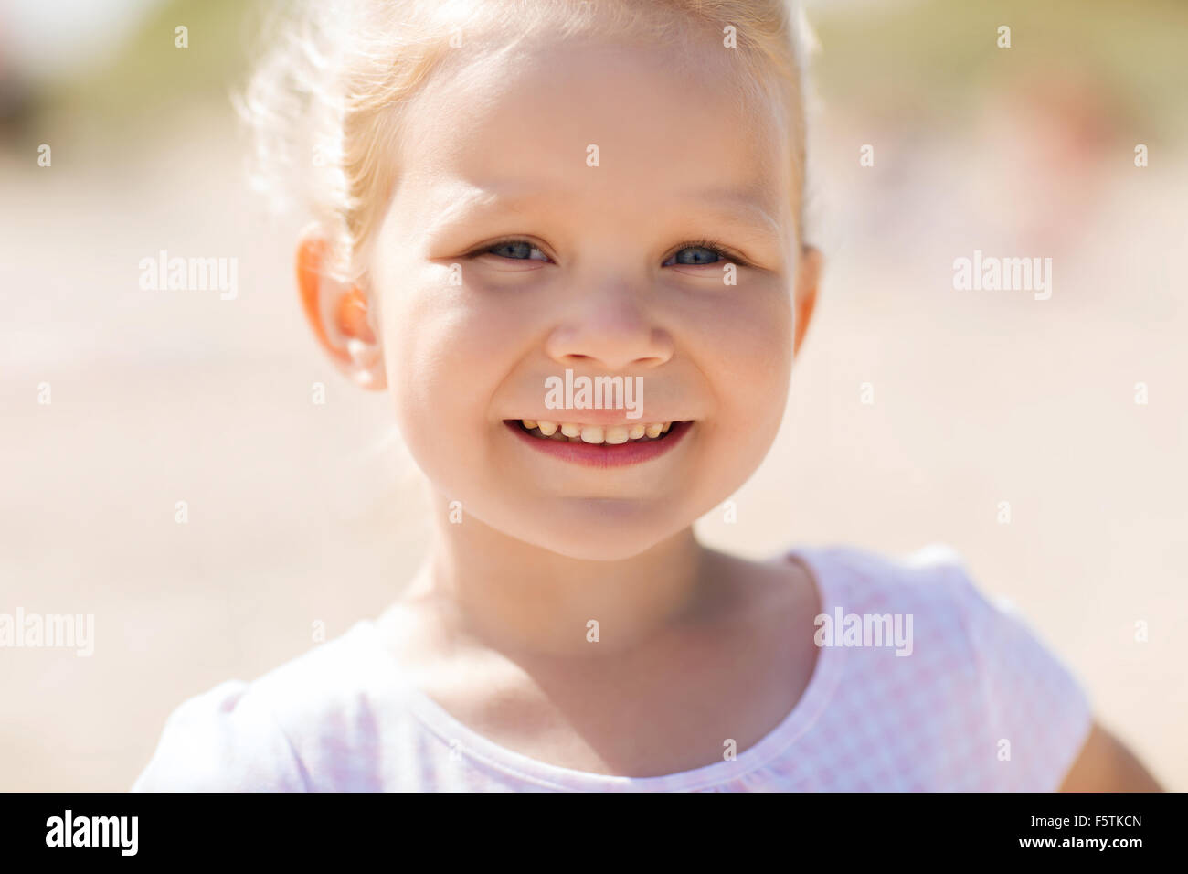 happy beautiful little girl portrait outdoors Stock Photo - Alamy