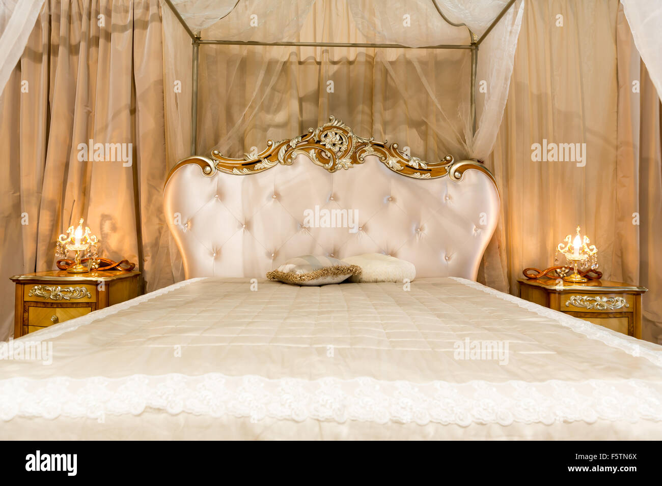 Classical bed in a contemporary setting Stock Photo Alamy