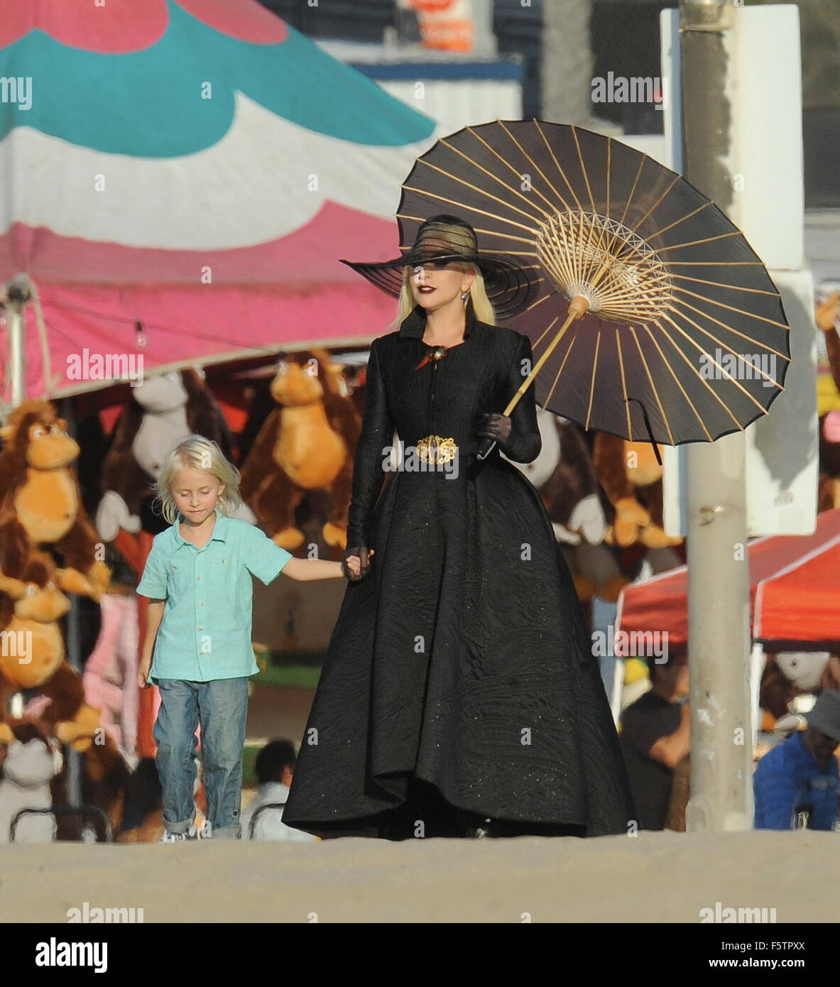 Countess Lady Gaga dress in all black for a beach carnival scene
