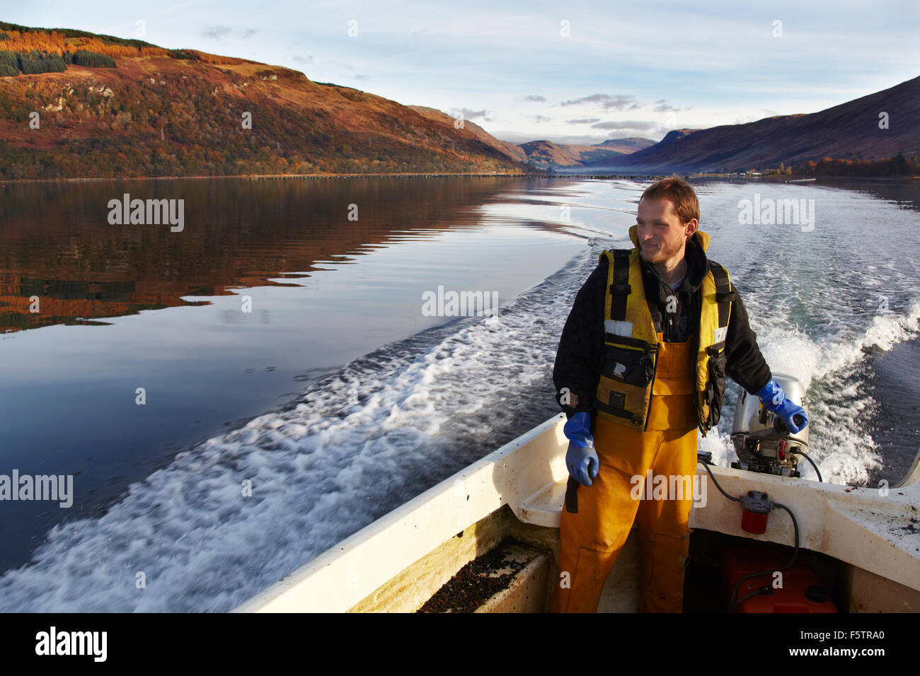 Martin on a launch at Loch Fyne oyster farm, Cairndow, nr Inverary, on
