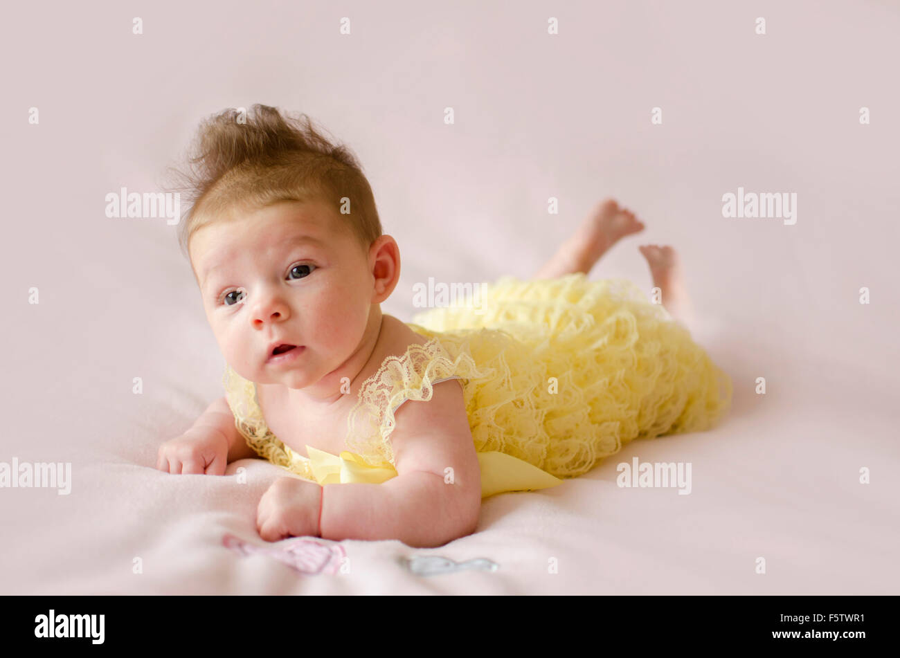 Cute baby girl in yellow dress cheap