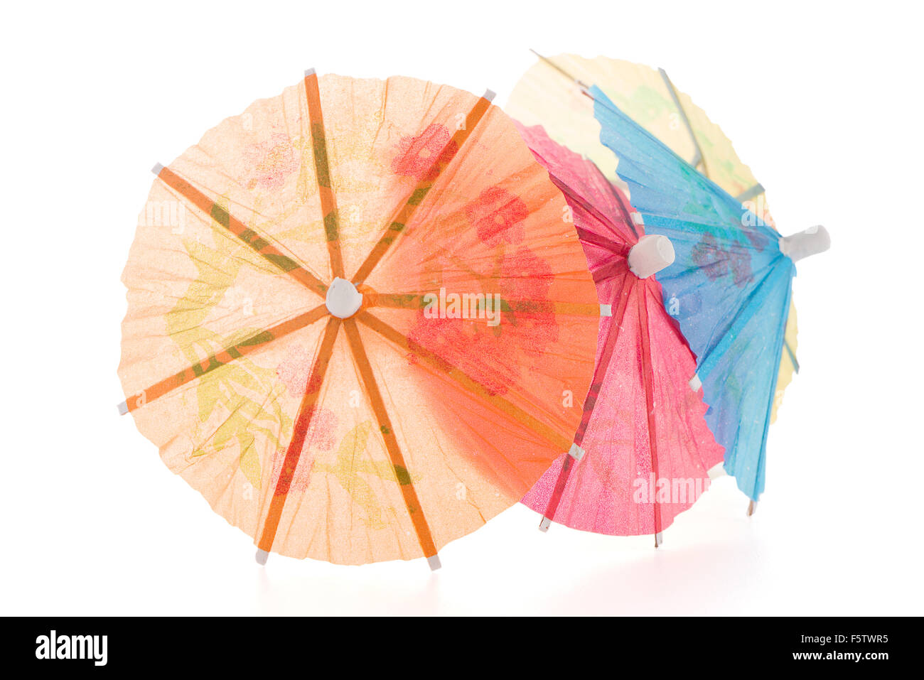 umbrellas for cocktails isolated on white background Stock Photo - Alamy