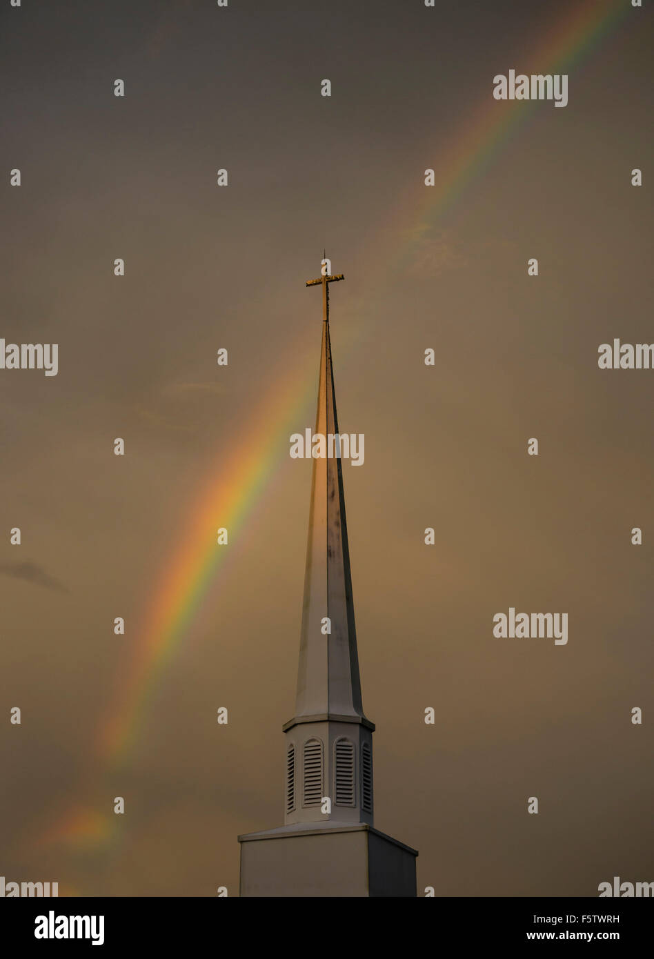 Rainbow over church hi-res stock photography and images - Alamy