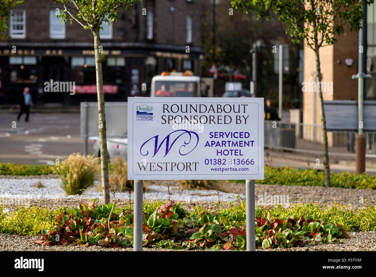 Roundabout along 138 West Marketgait sponsored by Westport Serviced Apartments and Luxury Hotels in Dundee, UK Stock Photo