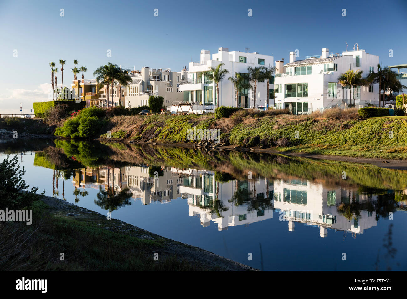 Beach houses in Marina del Rey, Los Angeles, California reflected in