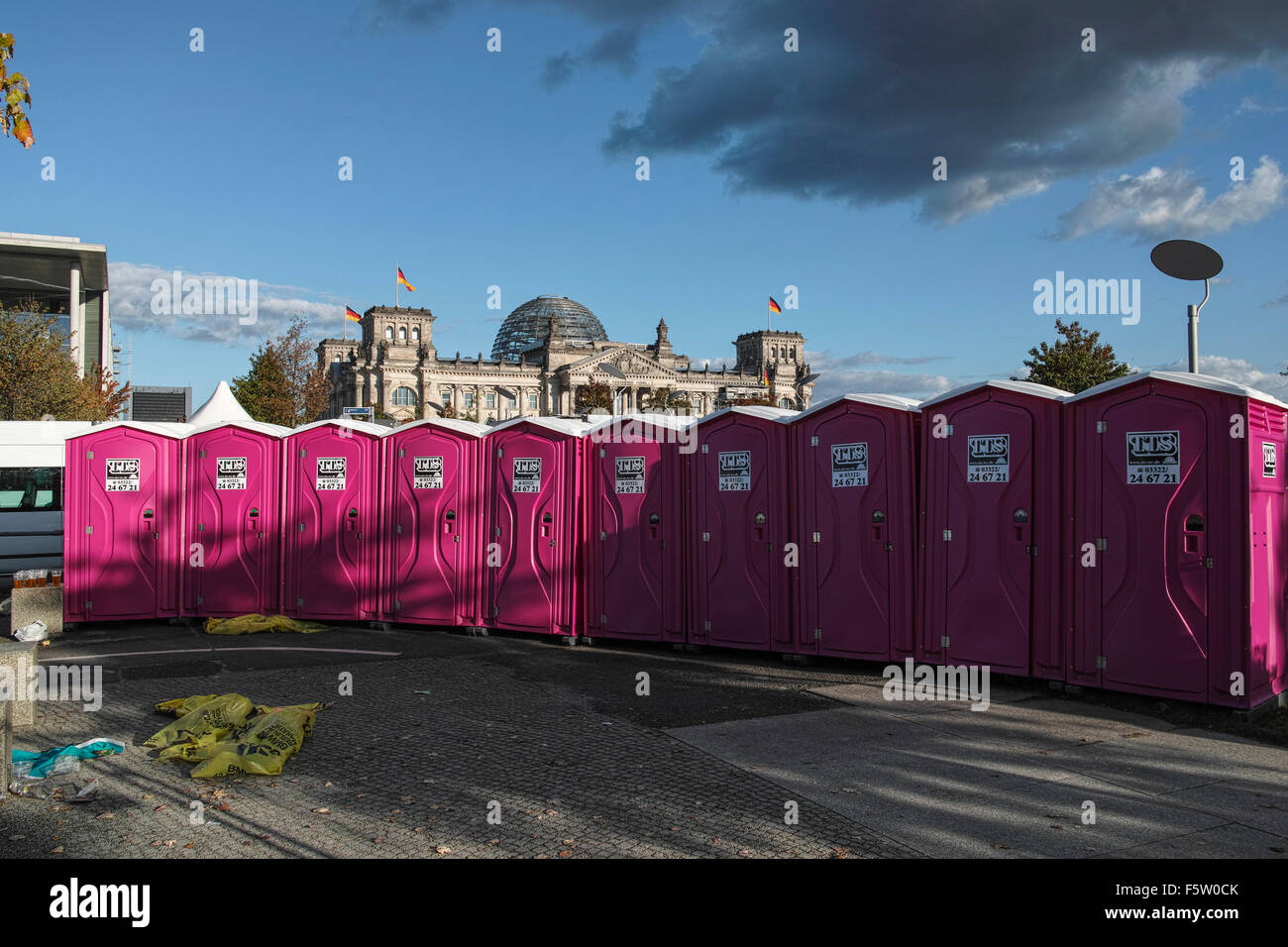 Pink Portable Toilets In Front Of The German Reichstag In Berlin