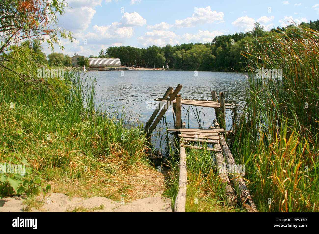 Old jetty on the lake. Rural scene Stock Photo - Alamy