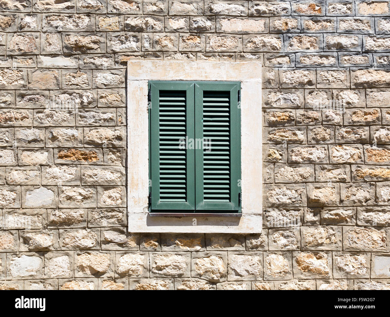 Old wooden window in a stone wall Stock Photo - Alamy