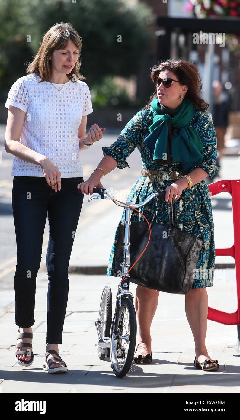 Kirstie Allsopp out in Notting Hill pushing along an adult scooter