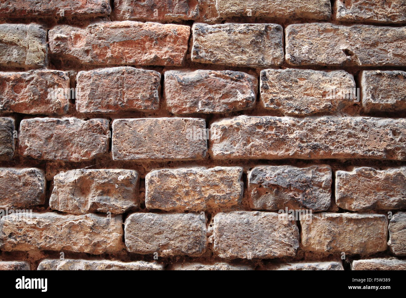 Weathered and old red brick wall Stock Photo