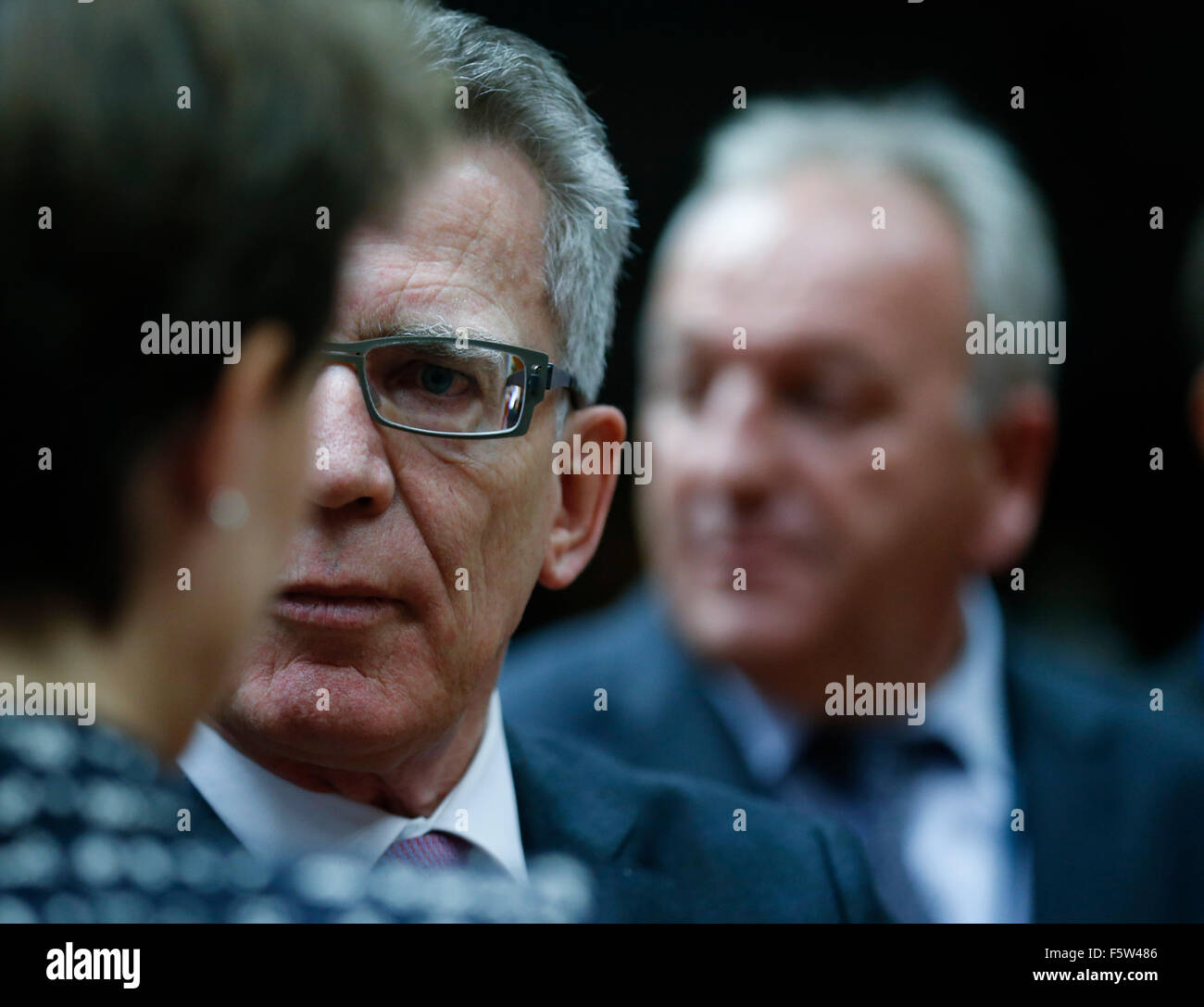 Brussels, Belgium. 9th Nov, 2015. German Interior Minister Thomas de Maiziere (C) talks with Swiss President and Justice Minister Simonetta Sommaruga (Front) during an minister-level emergency meeting on the migrant crisis, at the European Union (EU) headquarters in Brussels, Belgium, Nov. 9, 2015. Credit:  Ye Pingfan/Xinhua/Alamy Live News Stock Photo