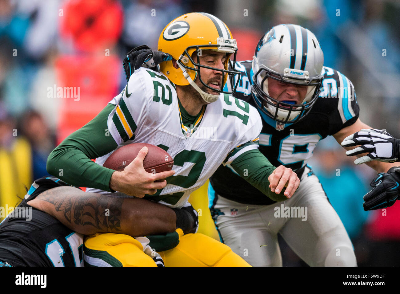 Green Bay Packers quarterback Aaron Rodgers (12) is sacked by