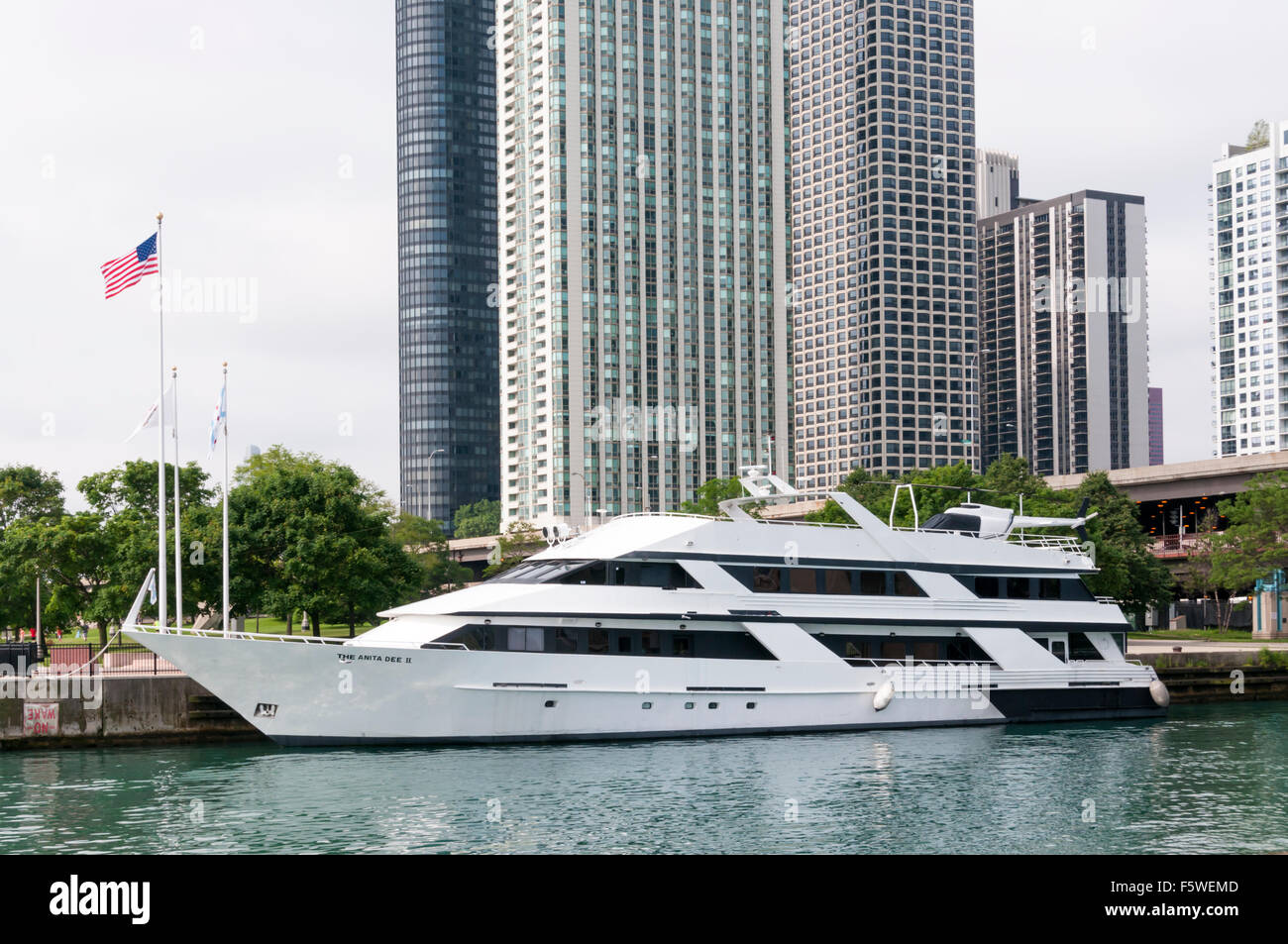 The Anita Dee II charter boat with on-board helicopter, moored in the Chicago River. Stock Photo