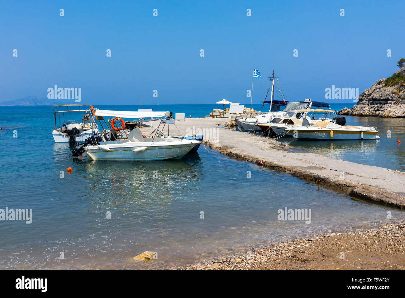 Fishing boats moored at Kolymbia Rhodes Dodecanese Greece Europe Stock Photo