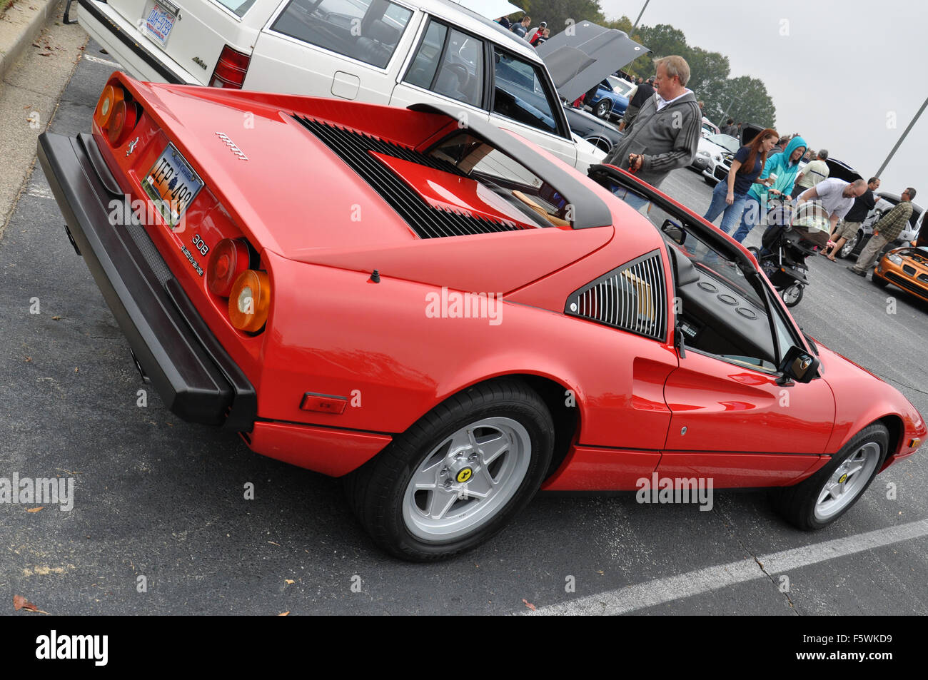 A Red Ferrari sports car at a car show. Stock Photo