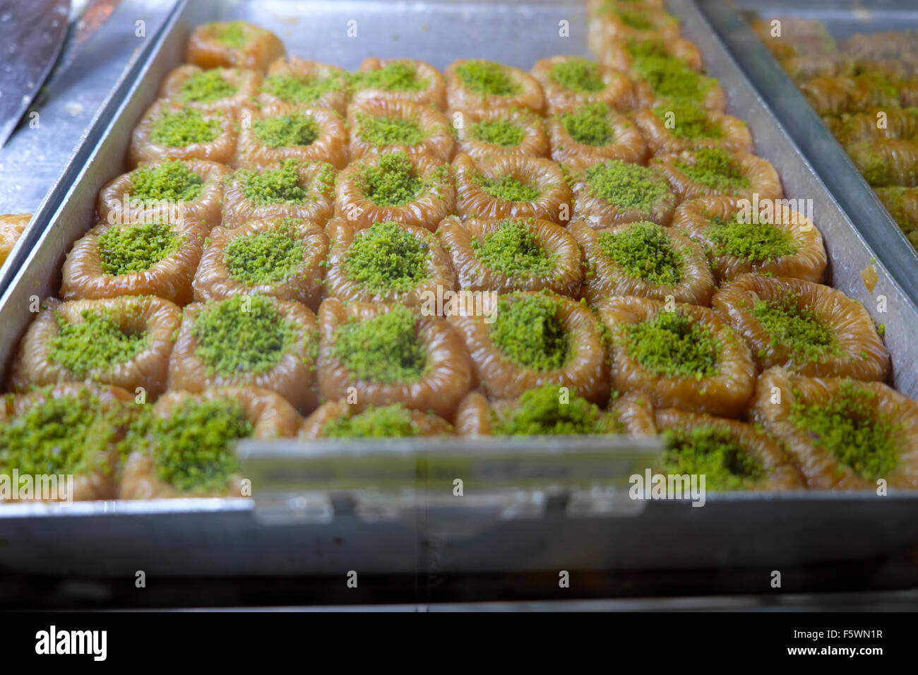 Fig and pistachio sweets food on display at Petek Pastanesi Patisserie Confectioner store shop and restaurant in Famagusta North Cyprus  KATHY DEWITT Stock Photo