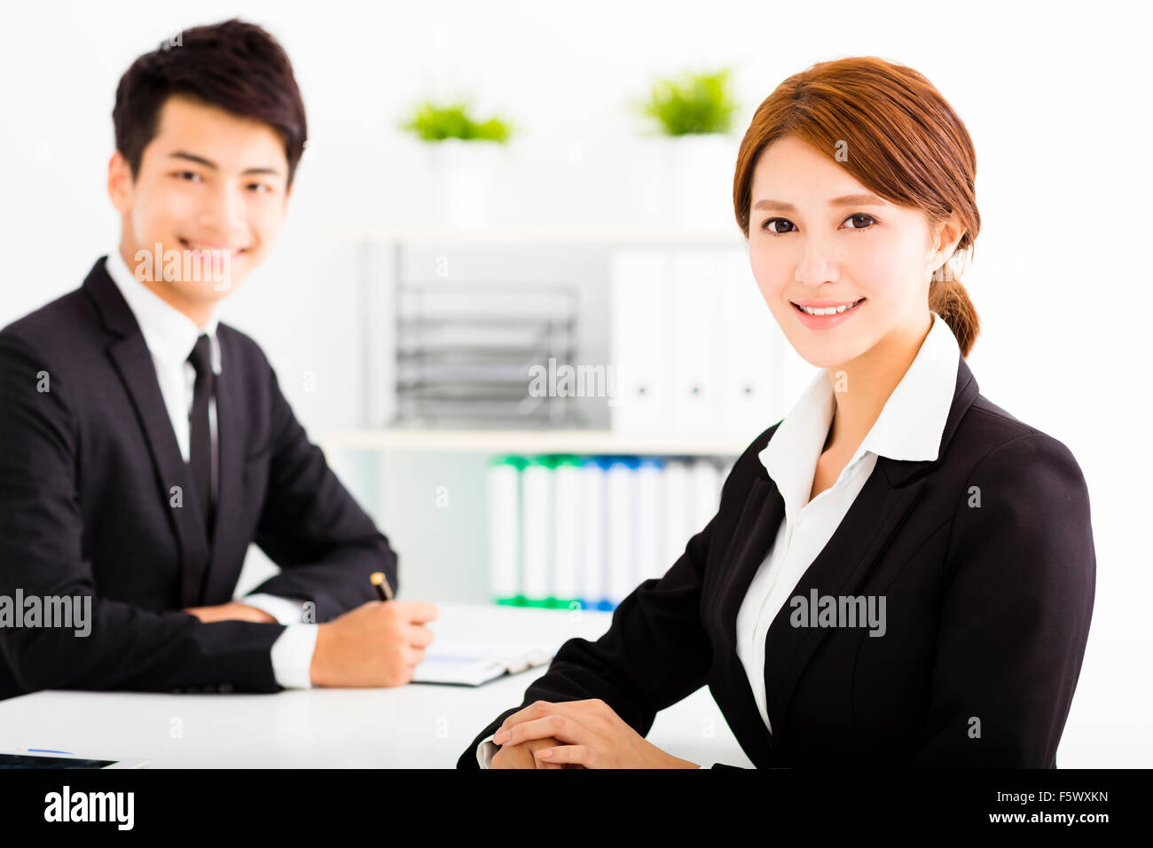 happy business man and woman working  in office Stock Photo