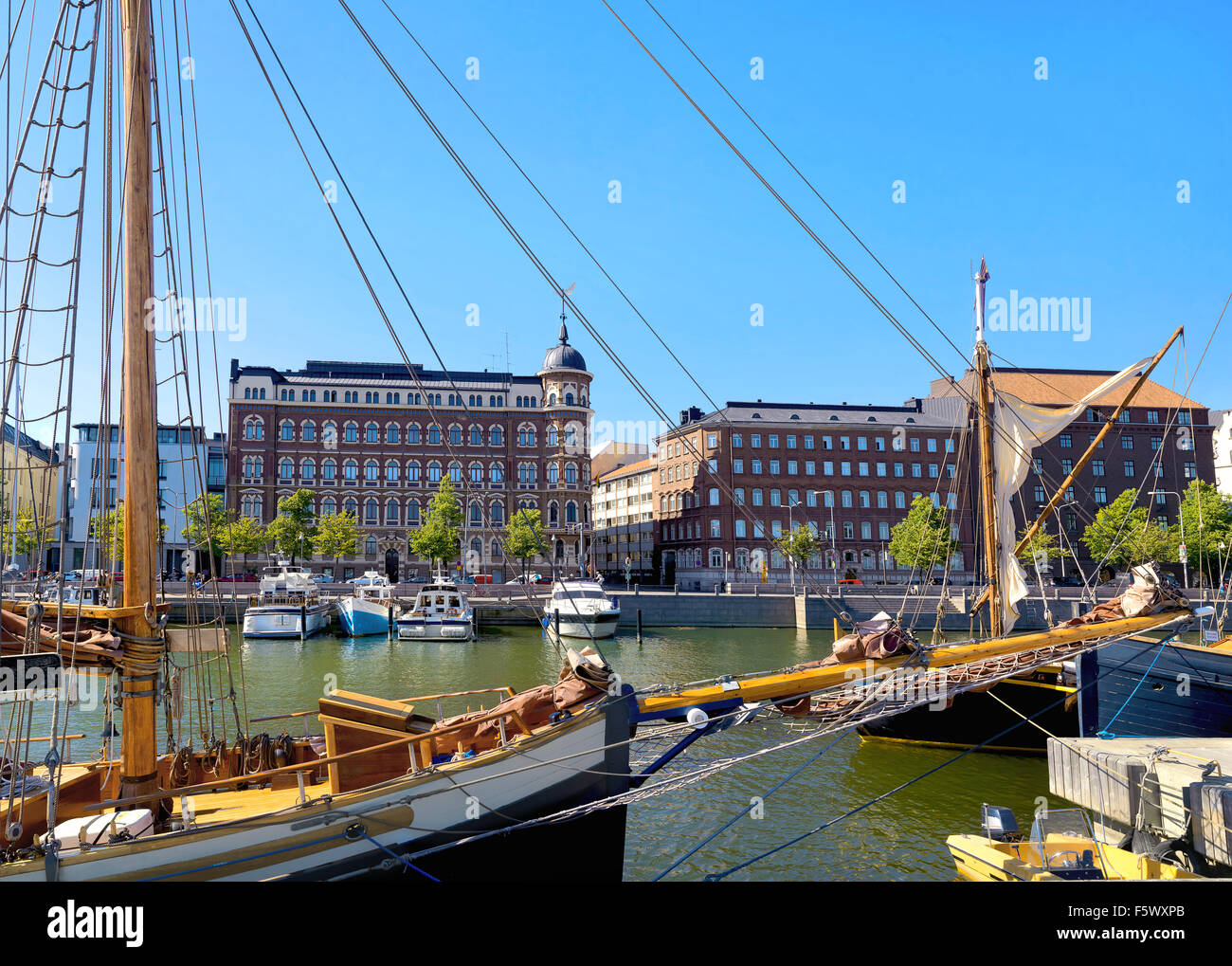 Embankment and pier with yachts in old town. Helsinki, Finland Stock ...