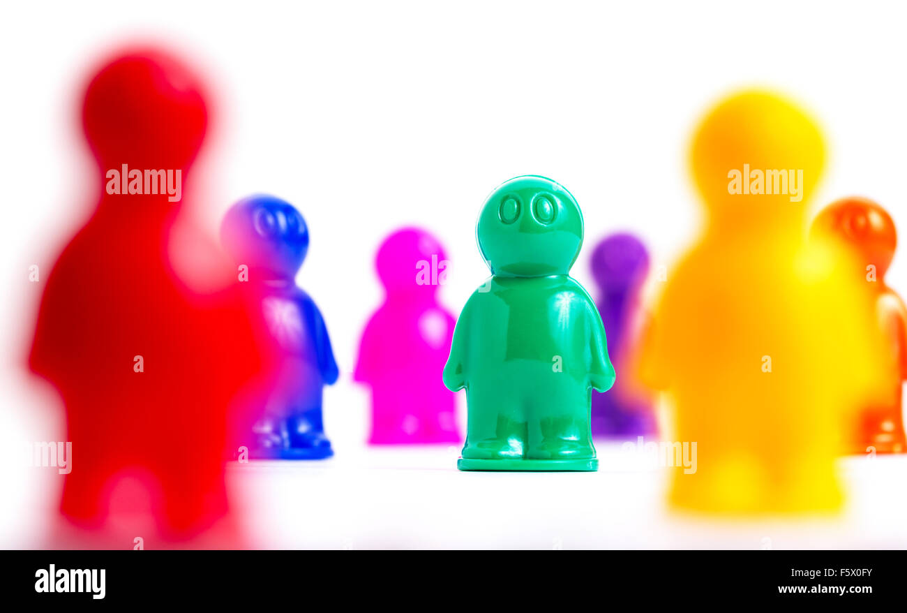 Crowd of colorful toy people on white Stock Photo Alamy