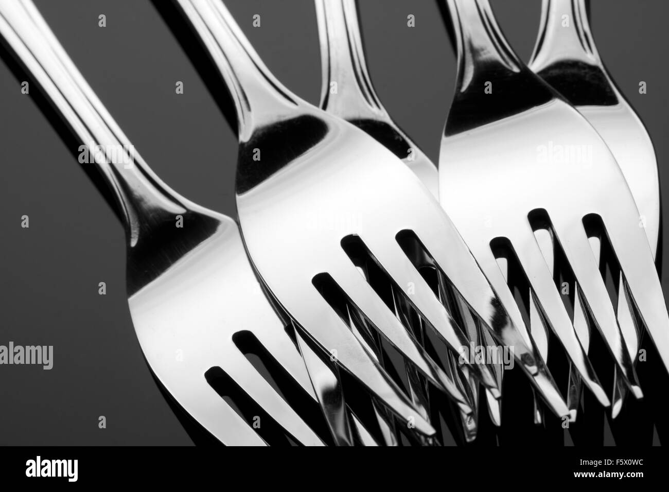 Group of silver forks. Close-up view Stock Photo