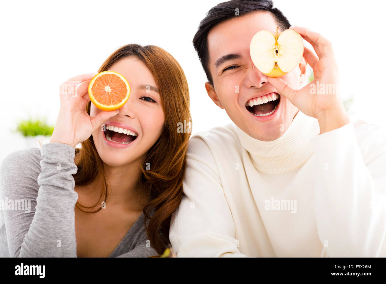 happy Young couple showing healthy food Stock Photo