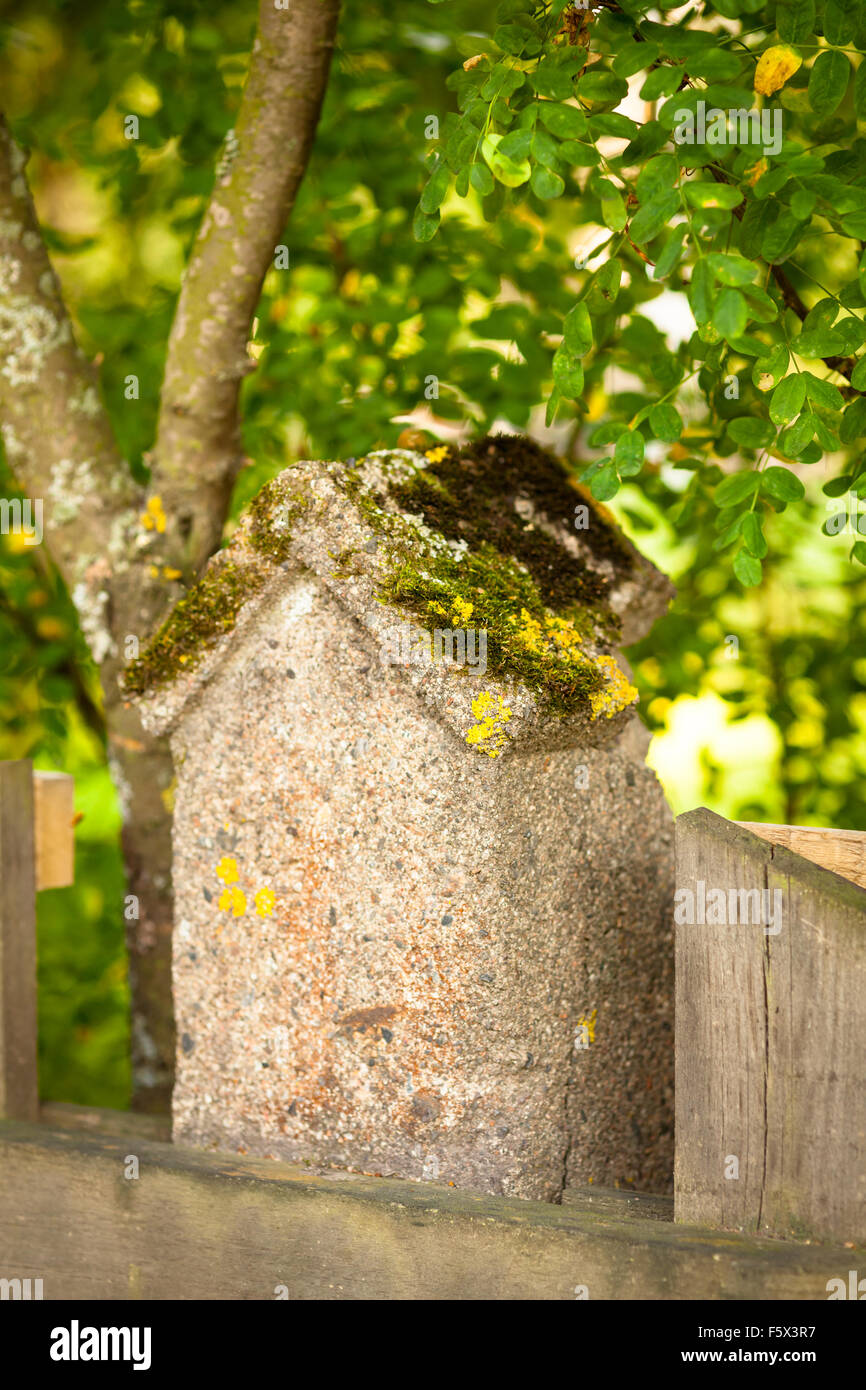 Stone fence and blurred forest background Stock Photo - Alamy