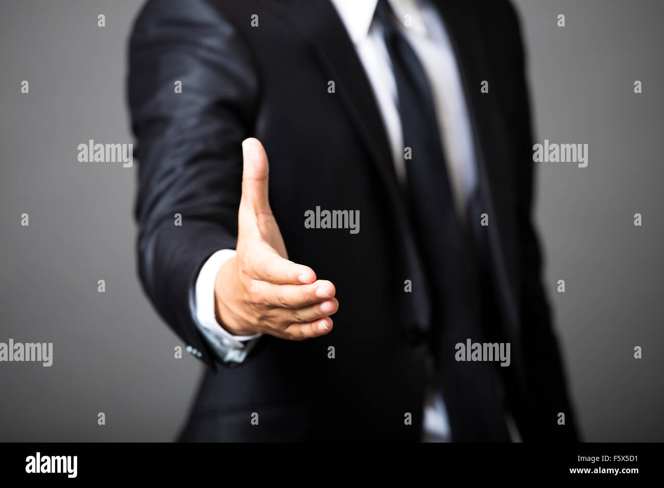 business man offering handshake Stock Photo
