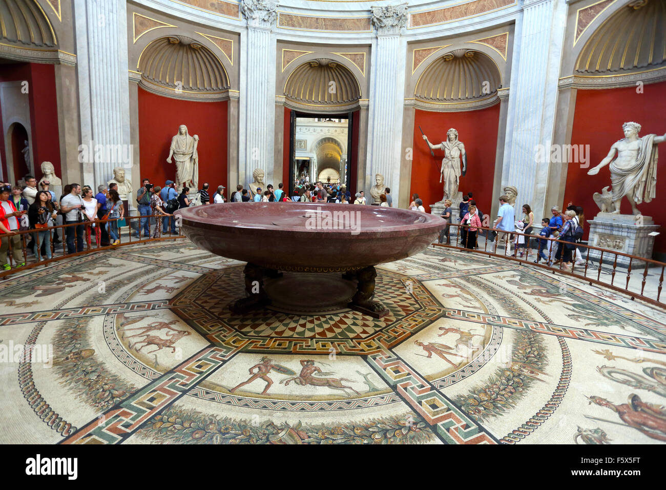 The Sala Rotunda featuring a large red porphyry bath in the Vatican Museum Stock Photo