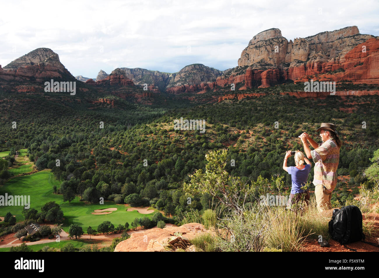 Light and clouds and rain above the Seven Canyons golf resort in Sedona, Arizona Stock Photo