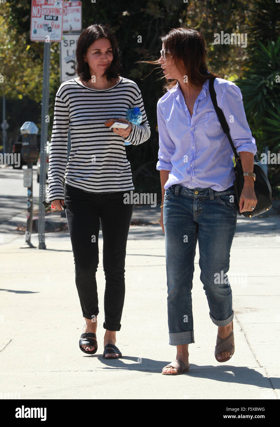 Courteney Cox in a striped top, goes shopping for carpets in West