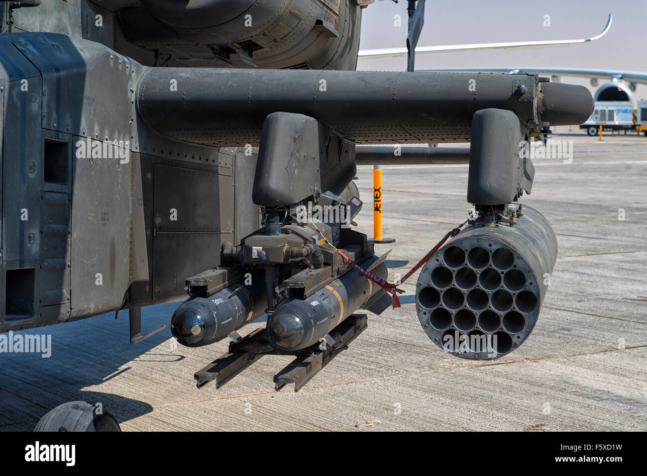 Weapons Holder on AH-64 Apache Helicopter at Dubai Air Show 2015 in Dubai, UAE Stock Photo