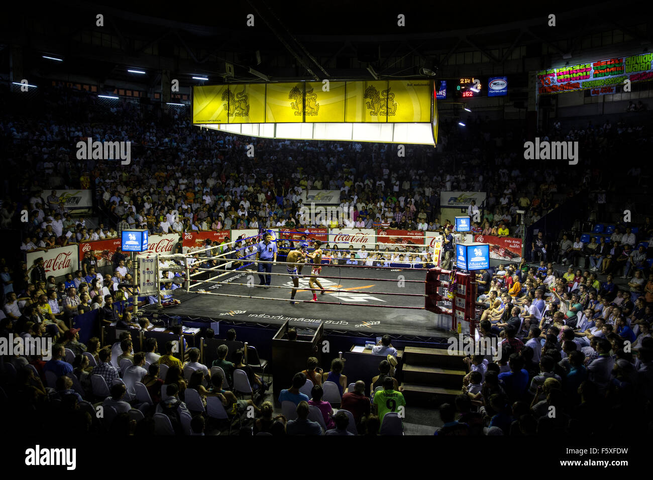 Muay Thai fight (Rajadamnern stadium, Bangkok, Thailand). Stock Photo