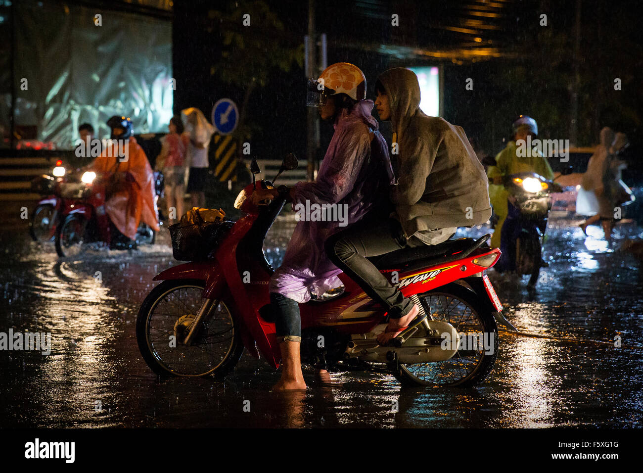 Drivers in heavy rains in Northern Thailand Stock Photo