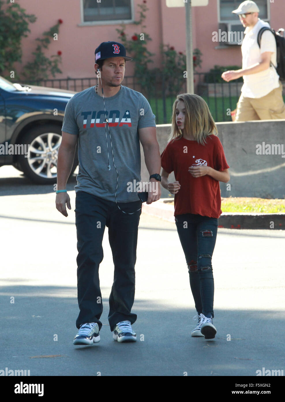 Mark Wahlberg and his daughter Ella Rae Wahlberg pick up red roses at
