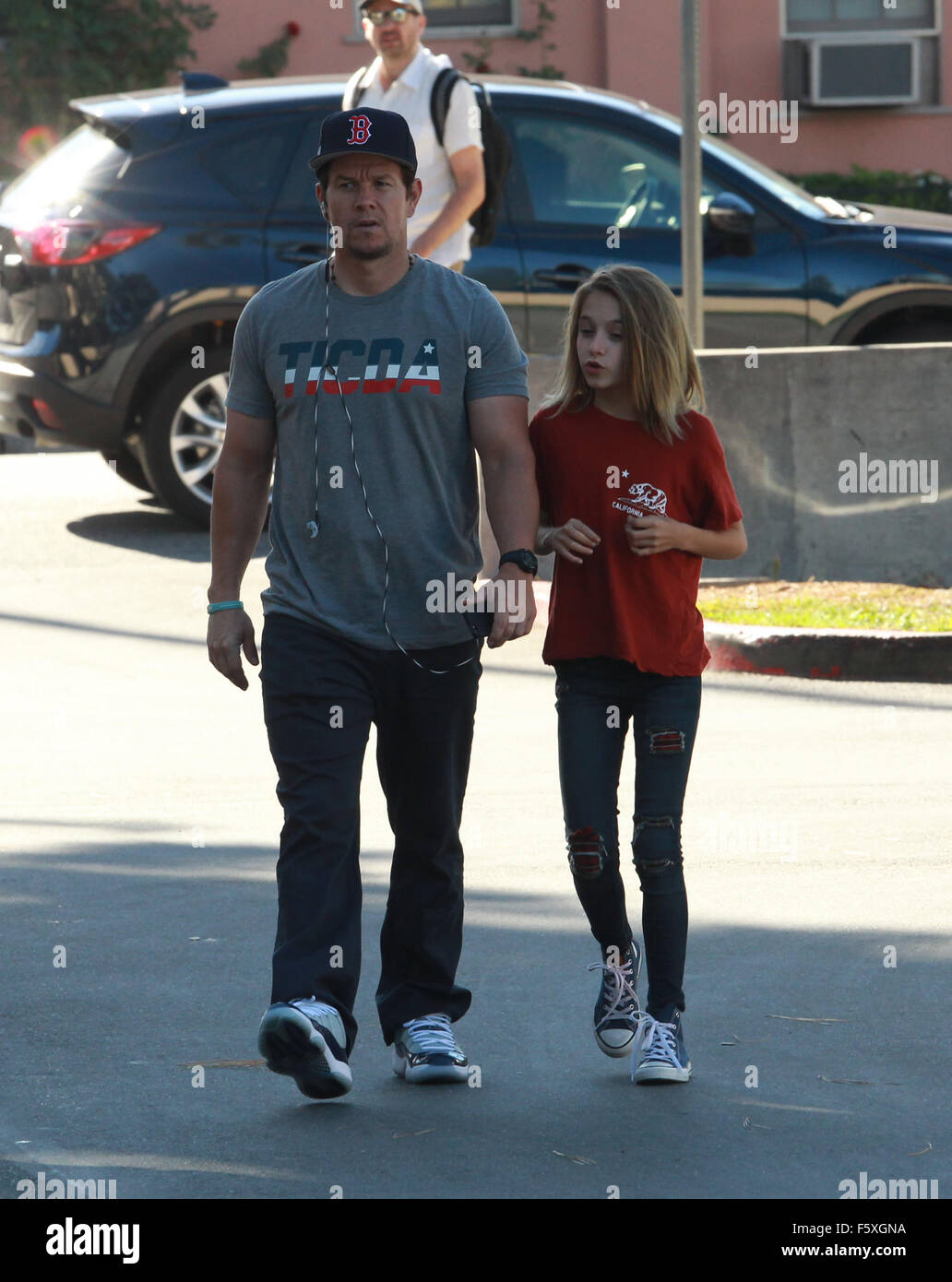 Mark Wahlberg and his daughter Ella Rae Wahlberg pick up red roses at ...