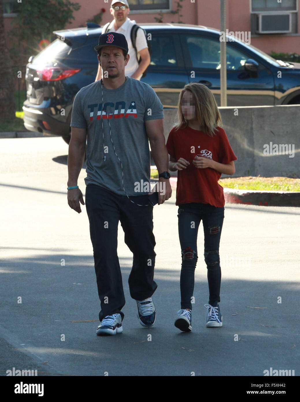 Mark Wahlberg and his daughter Ella Rae Wahlberg pick up red roses at ...