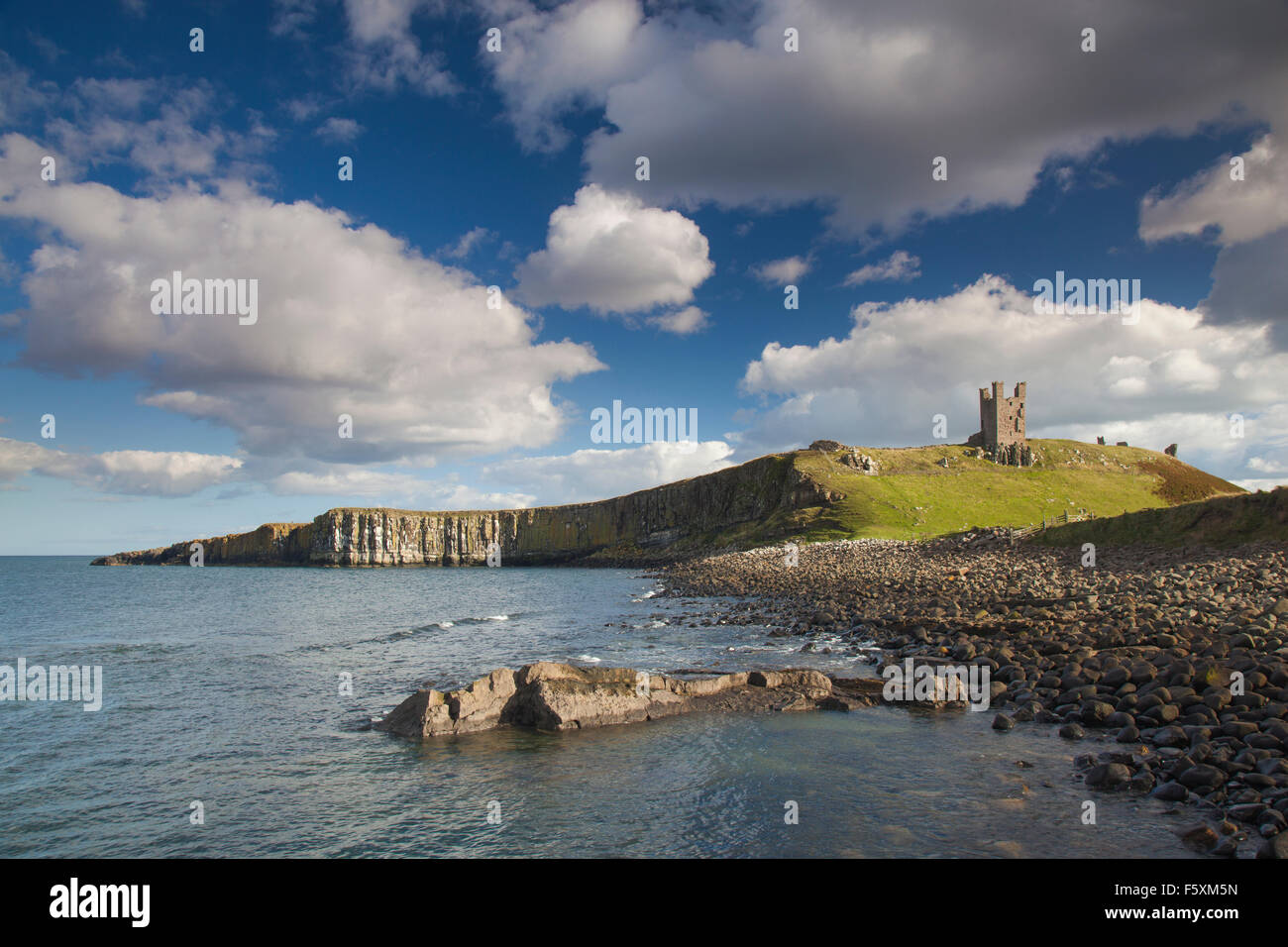 The ruin of Dunstanburgh Castle, Dunstanburgh, near Embleton, Northumberland, UK Stock Photo
